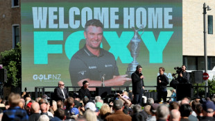 Open champion Fox welcomed home by thousands after 'whirlwind few days'