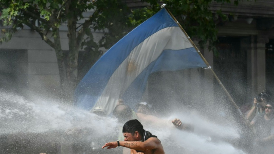 Protesters, police clash at protest over Milei labor reform