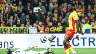 Lens go top of Ligue 1 with handsome Angers win