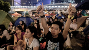 Hong Kong students dissolve pro-democracy group under 'severe' pressure