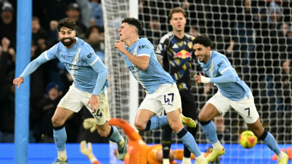 Last-gasp Foden goal spares Man City's blushes, Spurs crash again