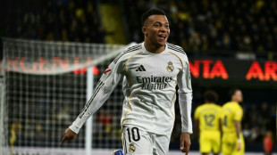Mbappe double at Villarreal takes Real Madrid top of La Liga