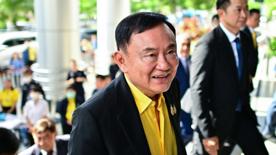 Thai ex-PM Thaksin lands in Bangkok ahead of crucial court date
